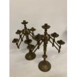 A PAIR OF VINTAGE BRASS CONCERTINA STYLE CANDLESTICKS