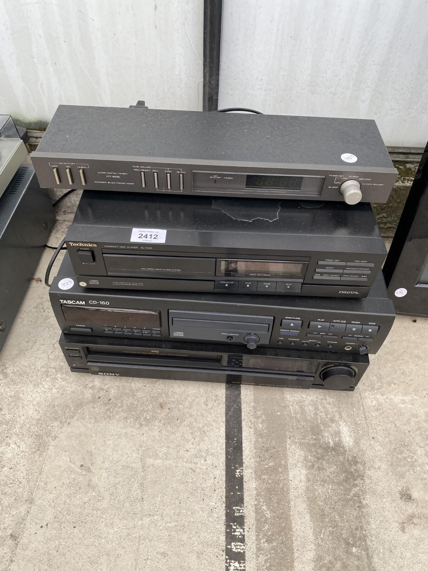 AN ASSORTMENT OF ITEMS TO INCLUDE A SONY VHS PLAYER, A TASCAM CD-160 AND A TECHNICS CD PLAYER ETC