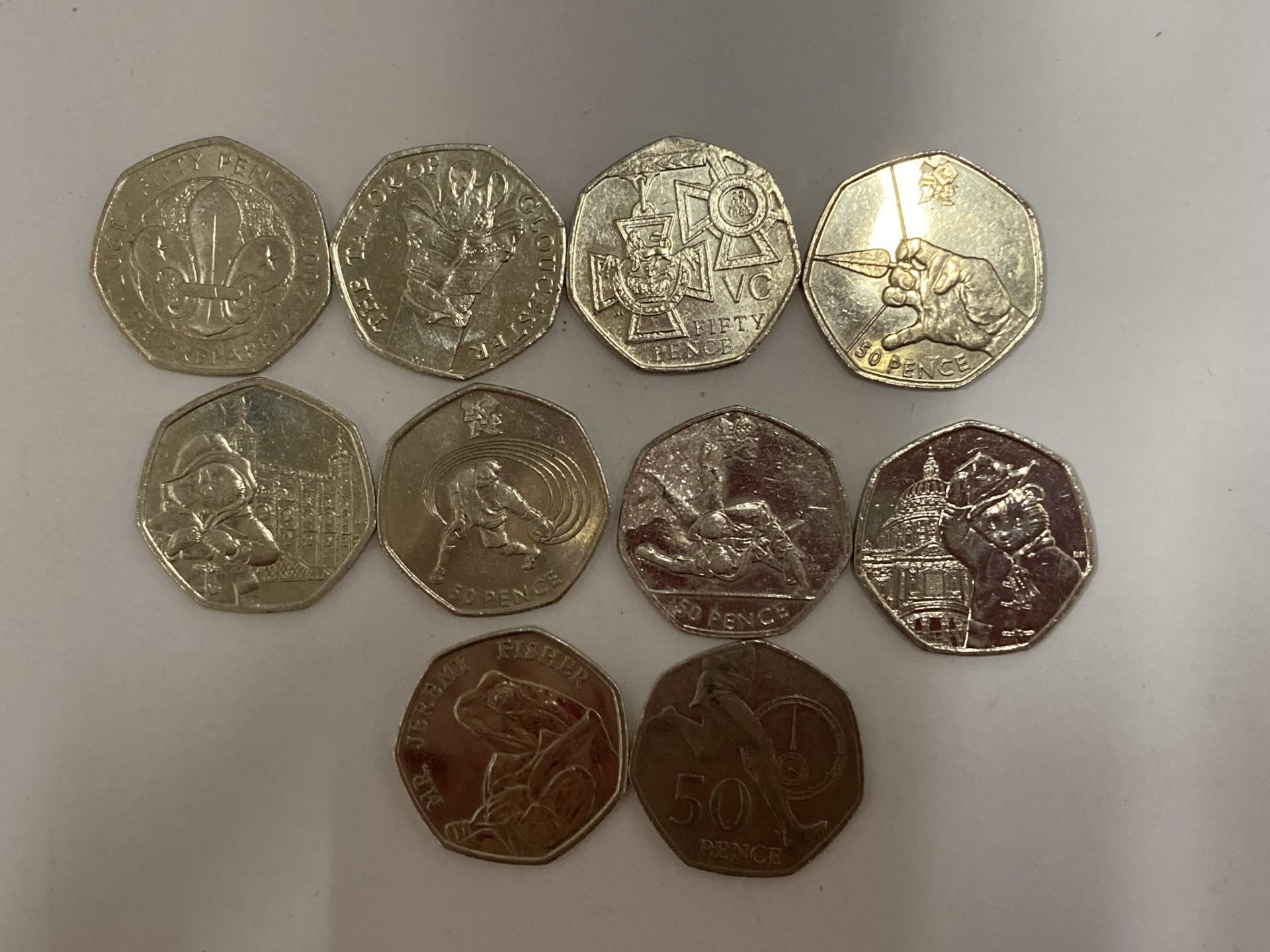 TEN VARIOUS COLLECTABLE FIFTY PENCE PIECES TO INCLUDE PADDINGTON BEAR, JEREMY FISHER, OLYMPICS ETC - Image 2 of 3