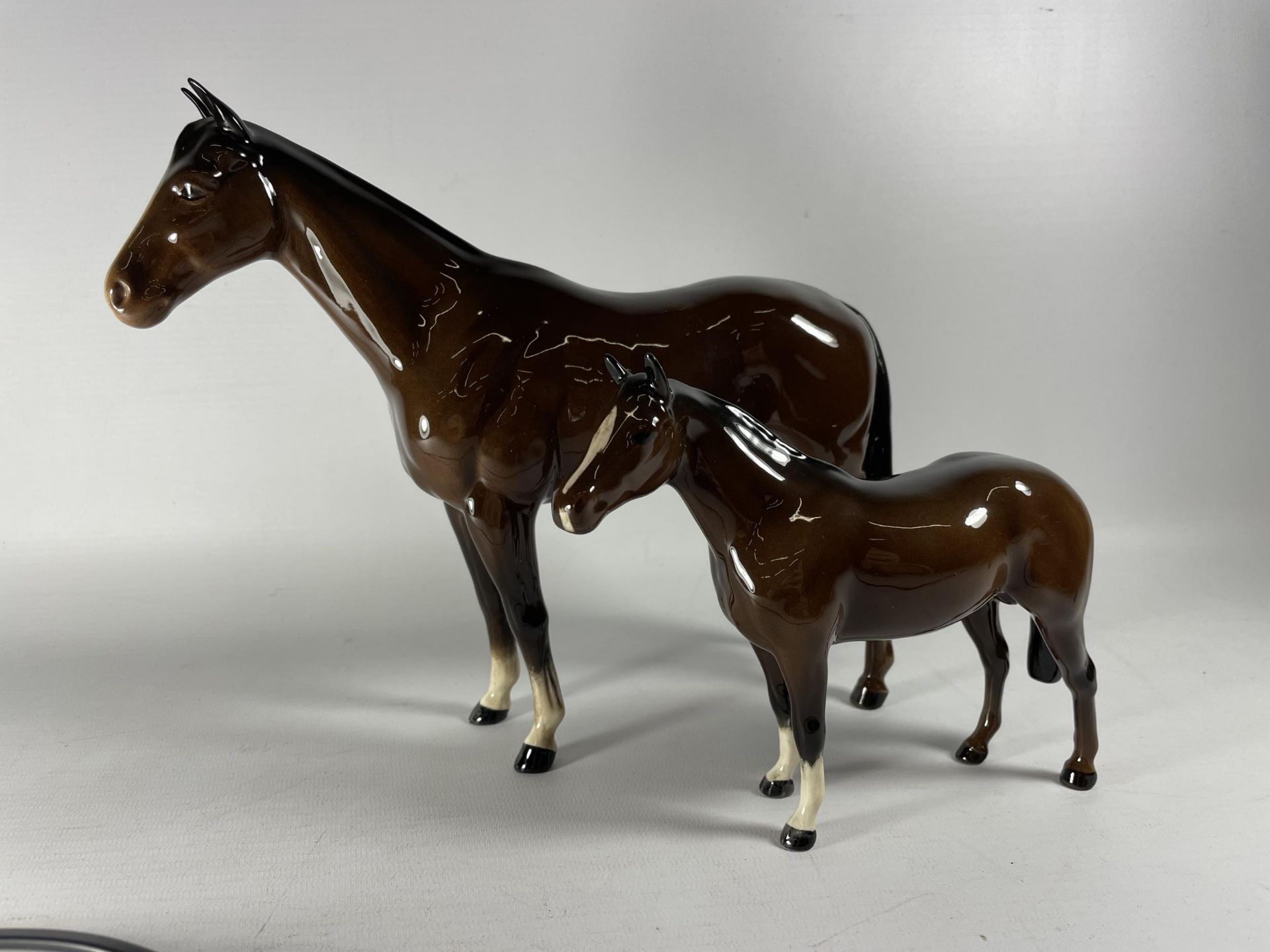 TWO BESWICK BROWN GLOSS HORSE MODELS - BOIS ROUSELL AND LARGE RACEHORSE
