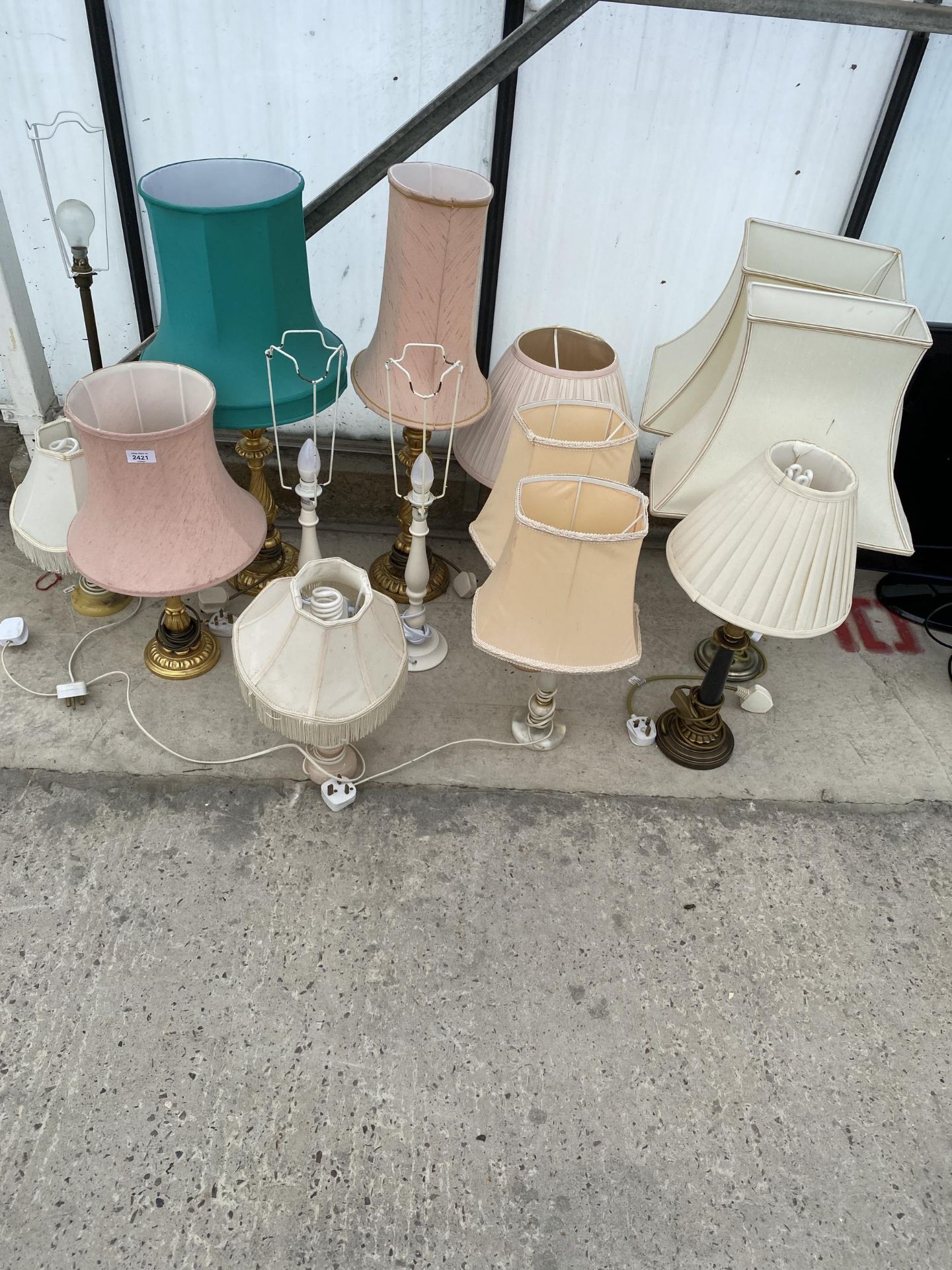 A LARGE ASSORTMENT OF VARIOUS TABLE LAMPS WITH SHADES