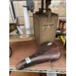 A VINTAGE ESSO BLUE PARAFIN CAN AND A VINTAGE LEATHER 'BROOKS' SADDLE