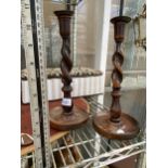 A PAIR OF VINTAGE OAK TURNED CANDLESTICKS