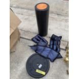 A CAST IRON WEIGHT, A WEIGHT PACK AND A MUSCLE ROLLER ETC