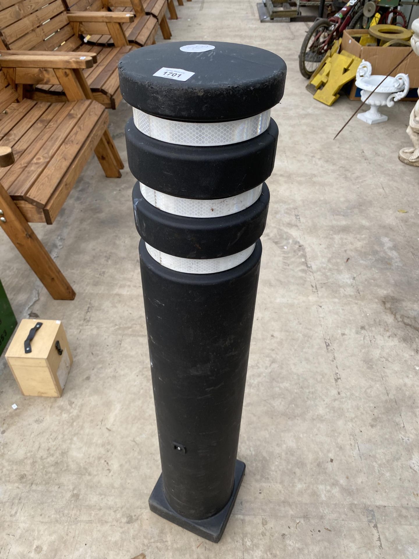 A SINGLE PLASTIC BOLLARD