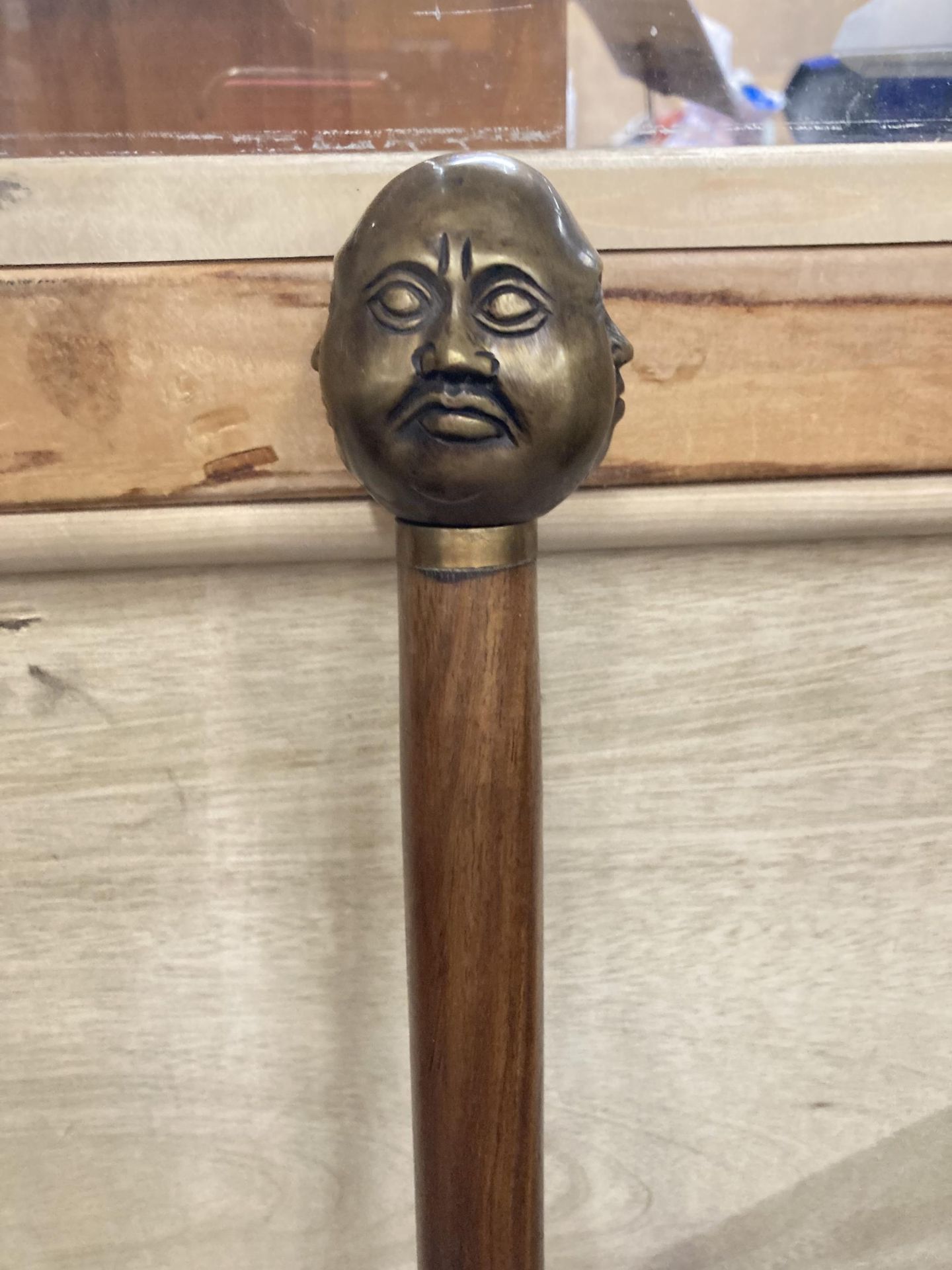 A WALKING STICK WITH A BRASS FOUR FACED BUDDAH HANDLE - Image 2 of 2