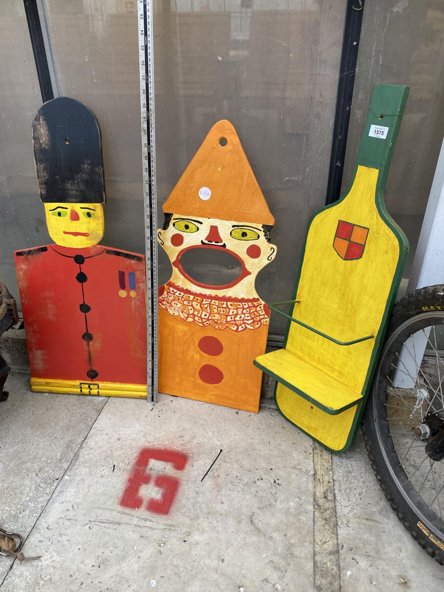 THREE VARIOUS HAND PAINTED SIGNS TO INCLUDE A WINE BOTTLE SHELF UNIT