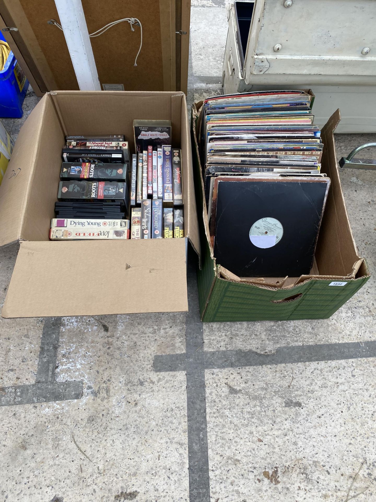 AN ASSORTMENT OF LP RECORDS, DVDS AND VHS