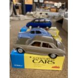 FOUR BOXED CORGI 'A CENTURY OF CARS' TO INCLUDE A PEUGEOT 504, 403 CABRIOLET, 806 AND 203