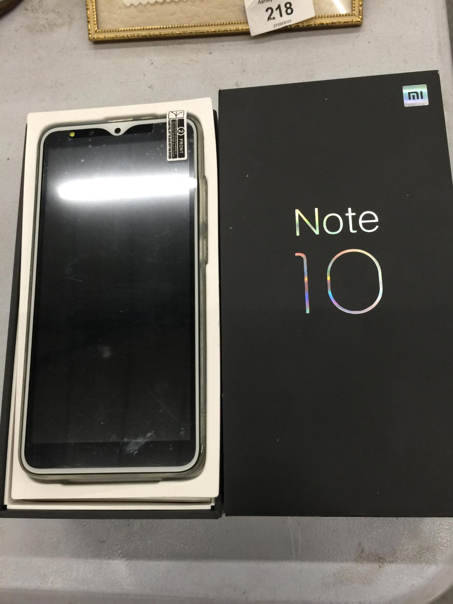 A Mi NOTE 10 MOBILE PHONE IN BOX, UNCHARGED SO CONDITION UNKNOWN
