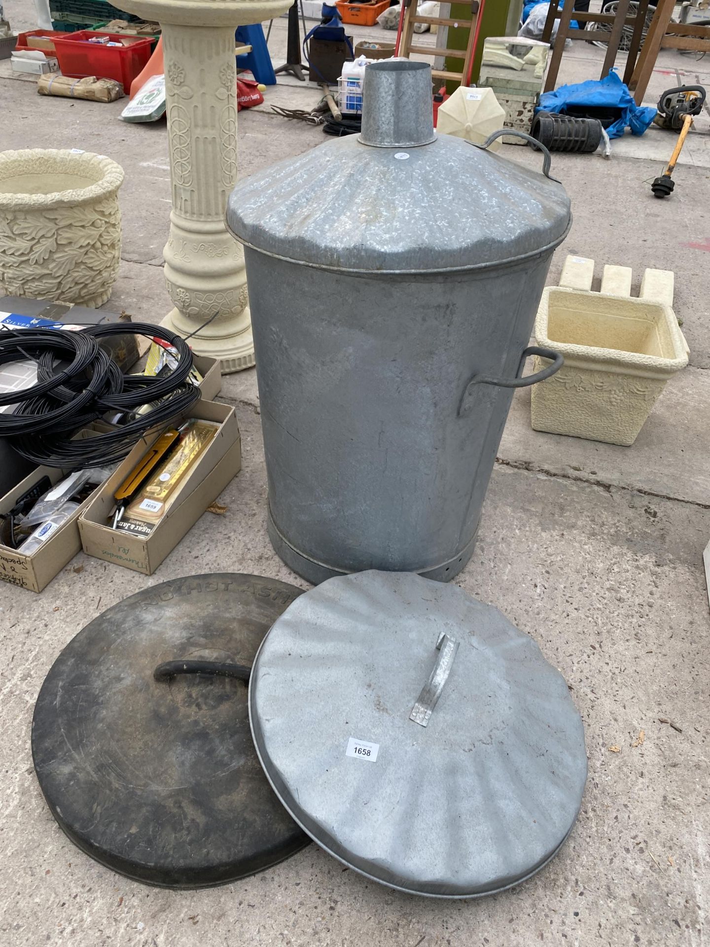 A GALVANISED GARDEN INSINERATOR AND TWO BIN LIDS