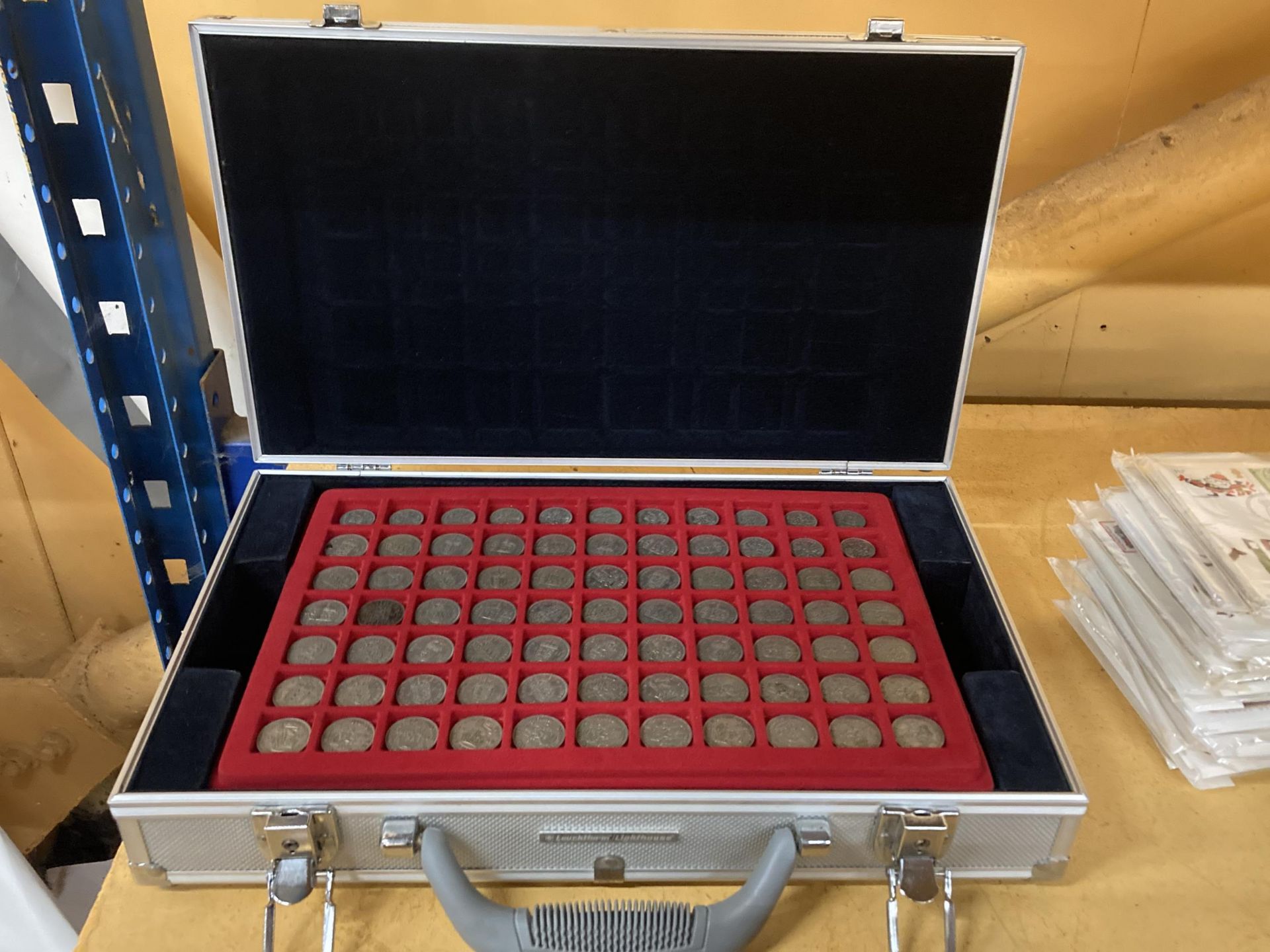A COIN COLLECTORS CASE WITH TWO TRAYS OF PRE DECIMAL POST 1946 SIXPENCES, SHILLINGS AND FLORINS