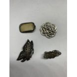 FOUR SILVER BROOCHES