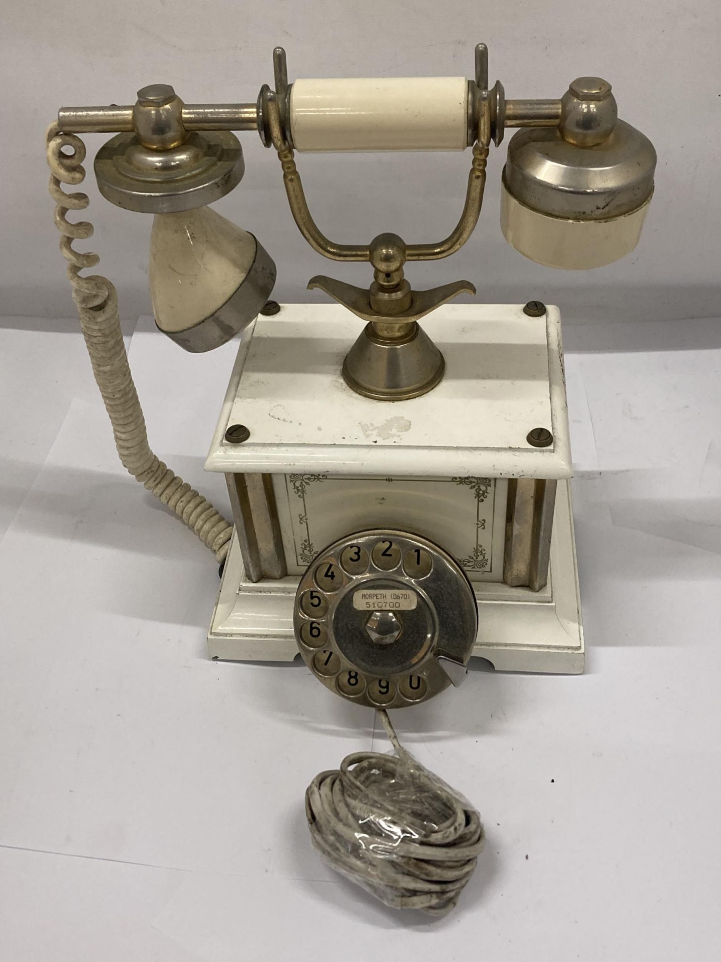 A VINTAGE ITALIAN TELEPHONE WITH GILT DESIGN