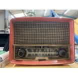 A VINTAGE RED EKCO RADIO