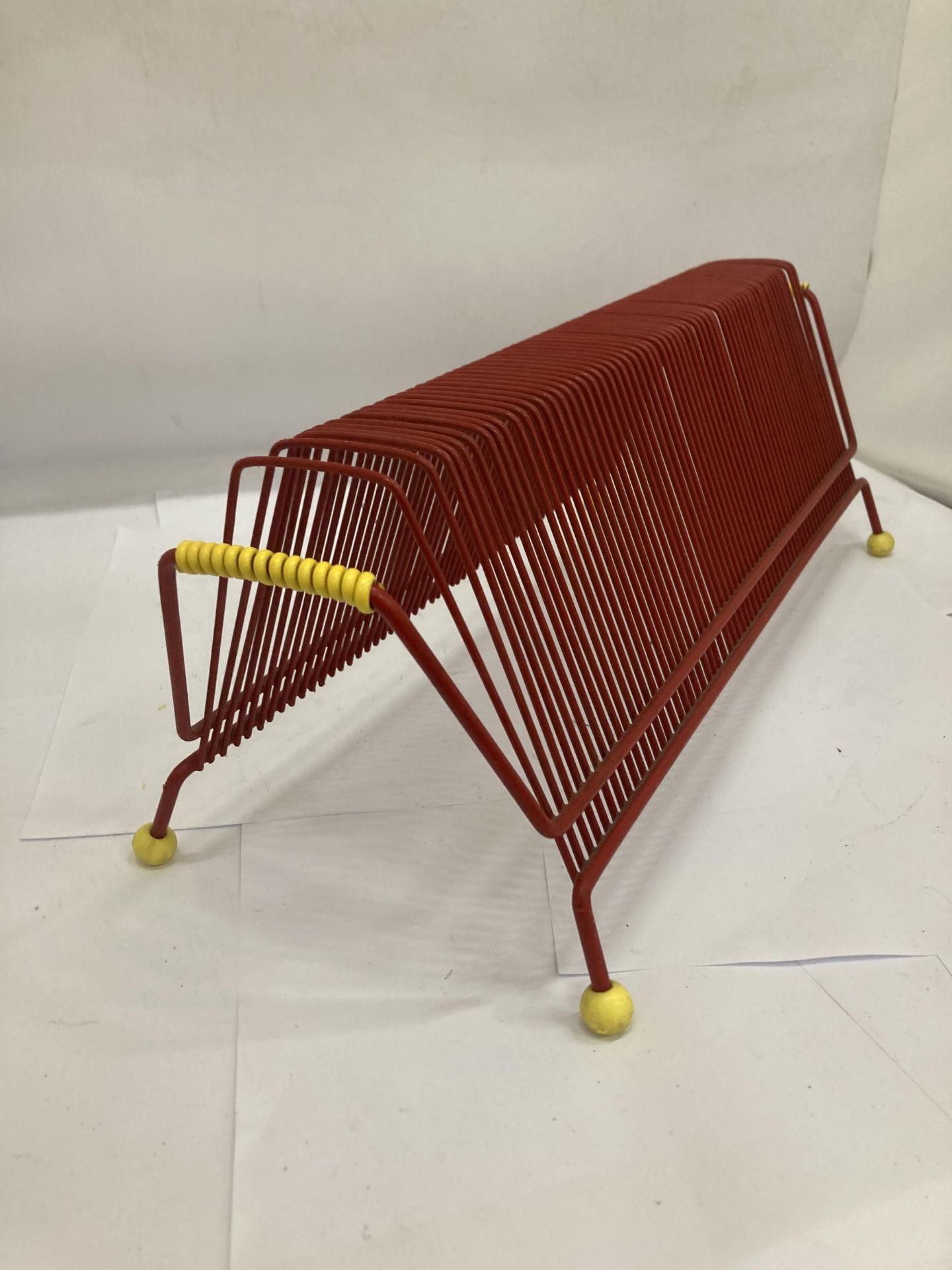 A RETRO RED TUBULAR RECORD RACK - Image 2 of 2