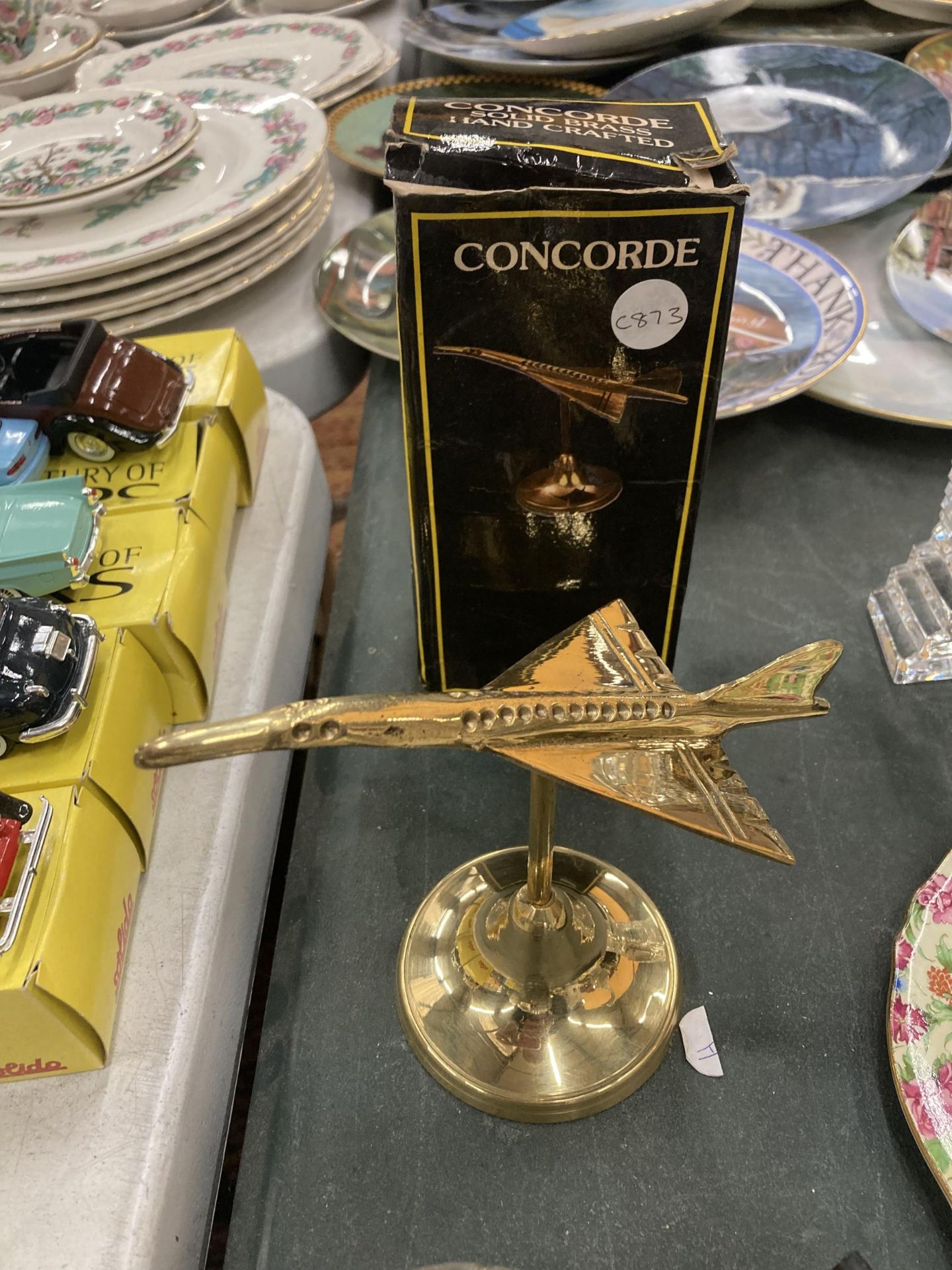 A BOXED BRASS MODEL OF A CONCORDE AEROPLANE