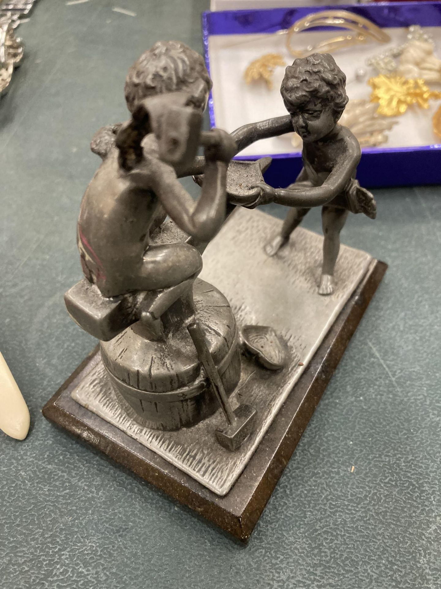 A PEWTER FIGURE OF A BLACKSMITH ON BASE - Image 2 of 3
