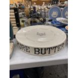 A 'PURE BUTTER' CERAMIC SHOP DISPLAY MARKED 'DAIRY SUPPLIES CO LIMITED, MUSEUM ST, LONDON'
