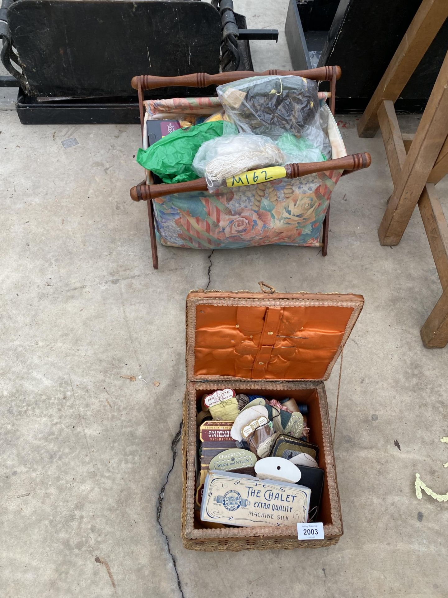 TWO SEWING BASKETS AND AN ASSORTMENT OF SEWING THREAD