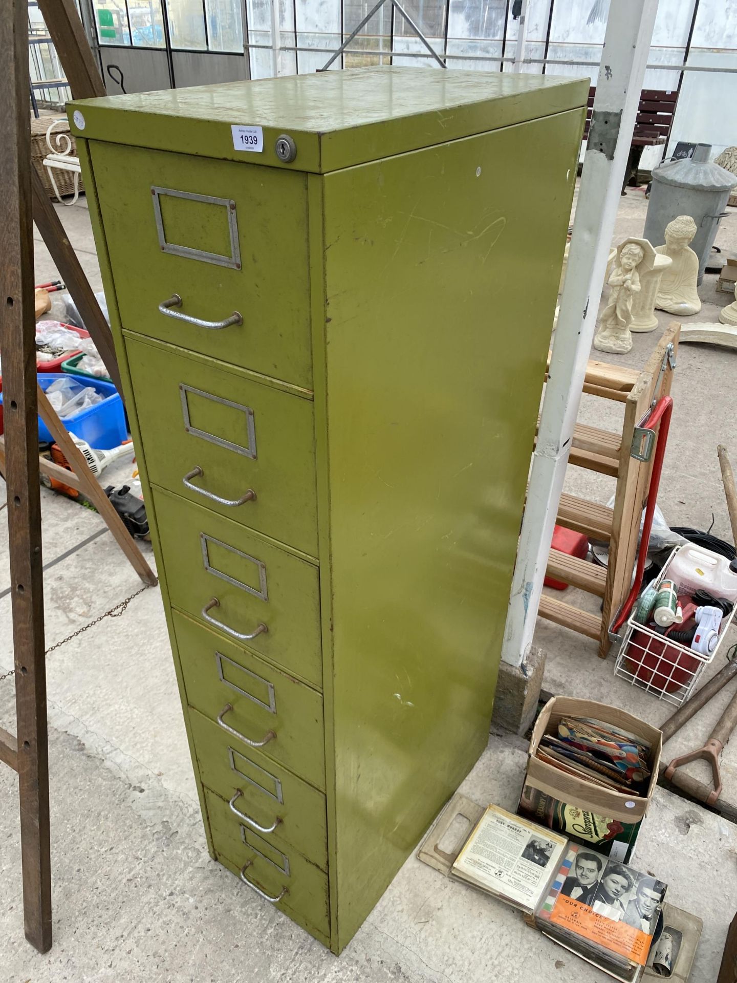 A VINTAGE METAL SIX DRAWER FILING CABINET