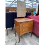 A MID 20TH CENTURY OAK DRESSING CHEST ENCLOSING TWO DRAWERS, 24" WIDE