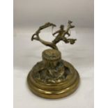 A VINTAGE NOVELTY BRASS INKWELL WITH A SINGING BOY IN A TREE