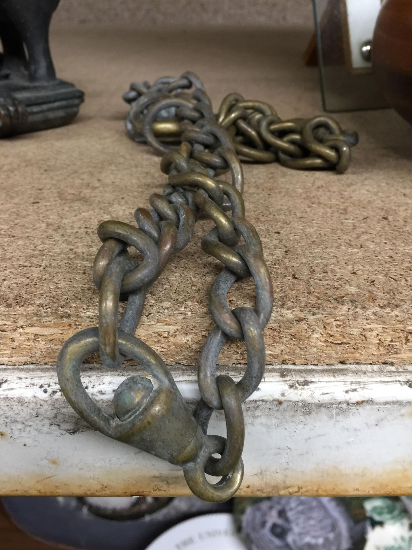 A BRASS HORSE CHAIN