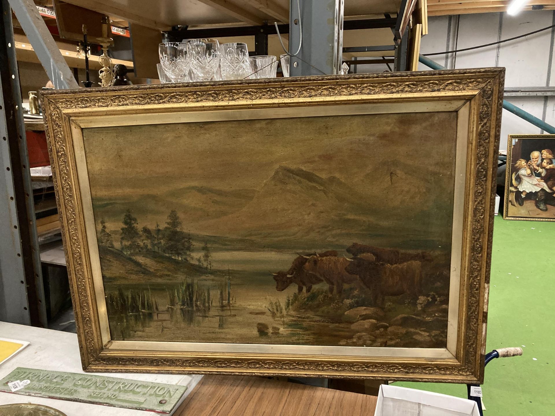 A VICTORIAN OIL PAINTING OF HIGHLAND CATTLE IN AN ORNATE GILT FRAME - A/F