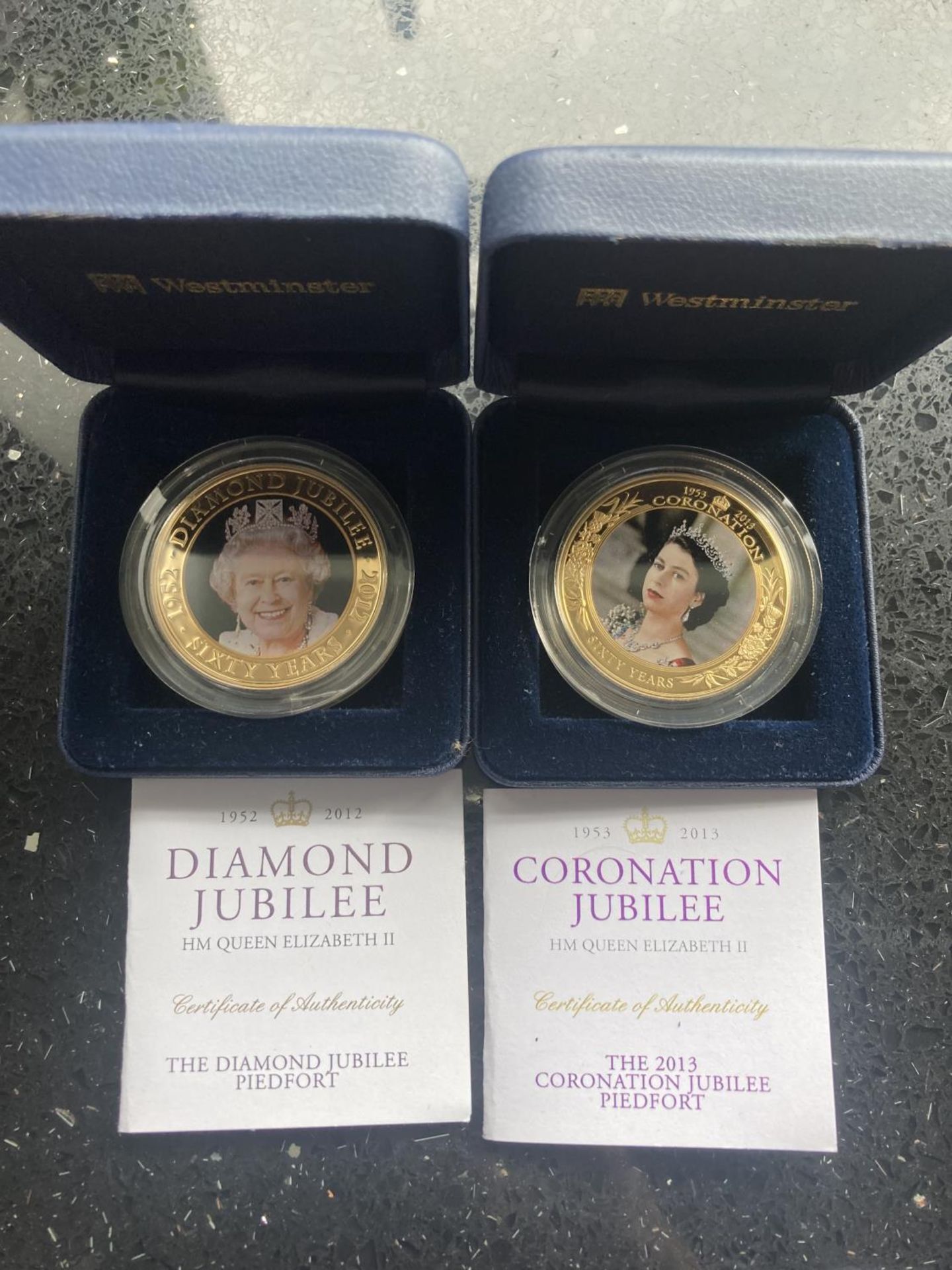TWO COOK ISLANDS JUBILEE PIEDFORT $1 COINS , BOTH BOXED WITH COA