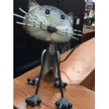 A METAL MODEL OF A NODDING CAT