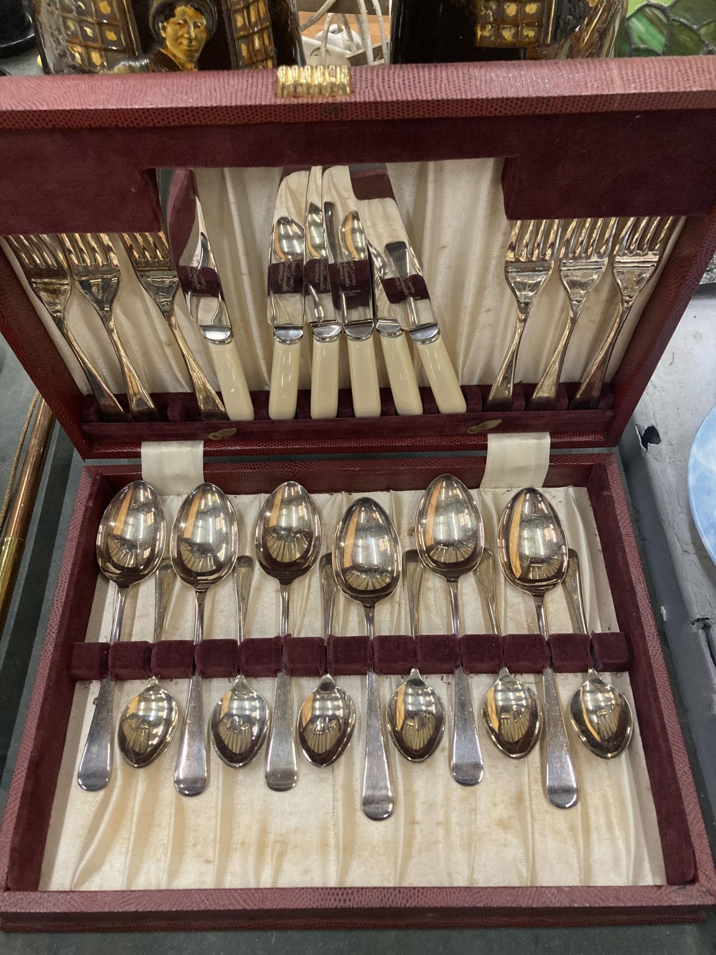 A CASED CANTEEN OF SILVER PLATED CUTLERY