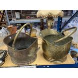 TWO VINTAGE HELMET COAL SCUTTLES, ONE BEING HAMMERED BRASS, THE OTHER COPPER AND BRASS
