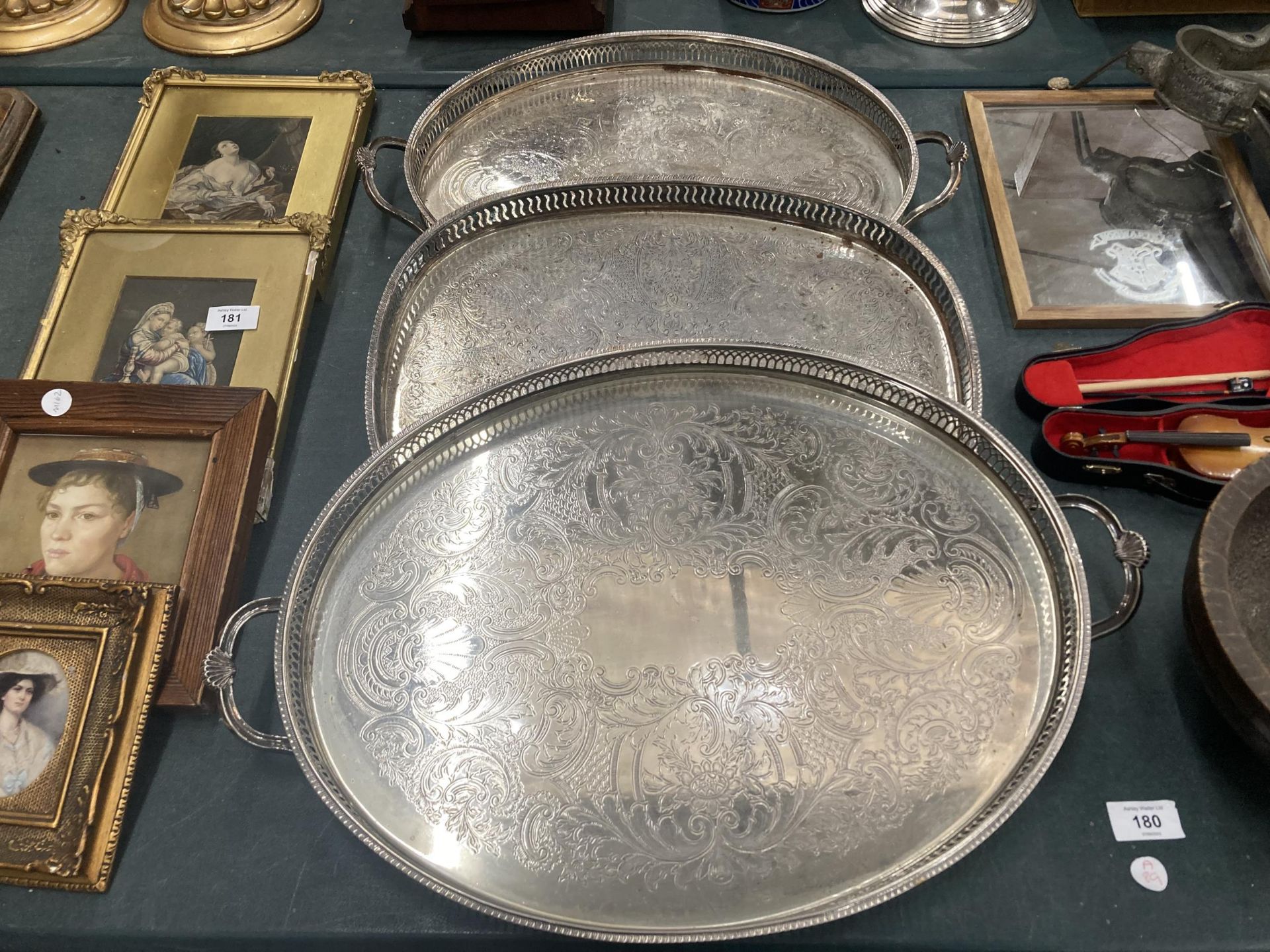 A GROUP OF THREE VINTAGE SILVER PLATED DRINKS TRAYS