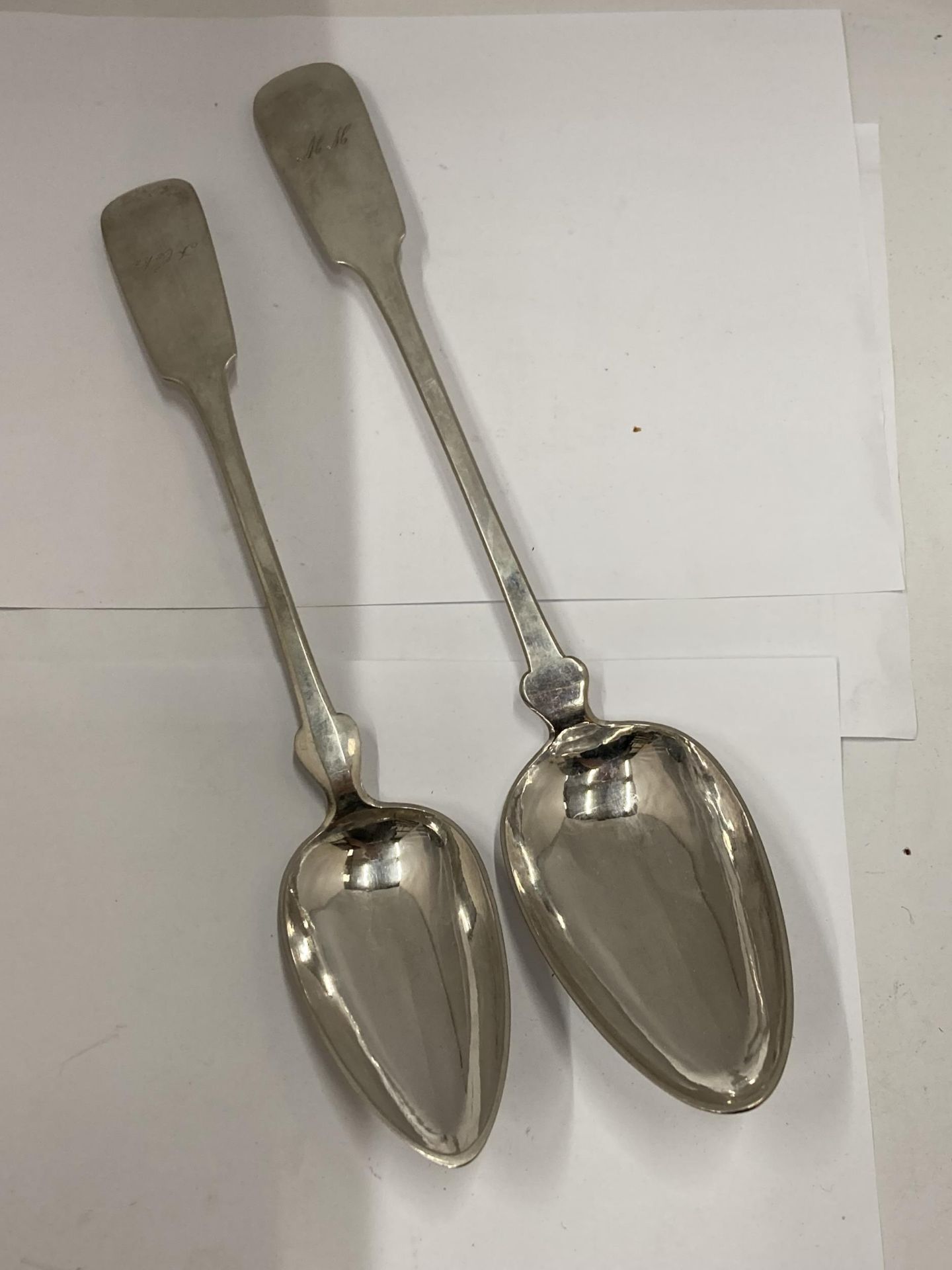 TWO CONTINENTAL SILVER BASTING SPOONS ONE ENGRAVED 1865 GROSS WEIGHT 288.2 GRAMS