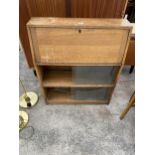 A RETRO OAK BOOKCASE WITH SLIDING GLASS DOORS, 33" WIDE