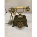 A HEAVY VINTAGE BRASS ORNATE TELEPHONE