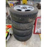 A SET OF FOUR CAR RIMS WITH 195/55R16 TYRES