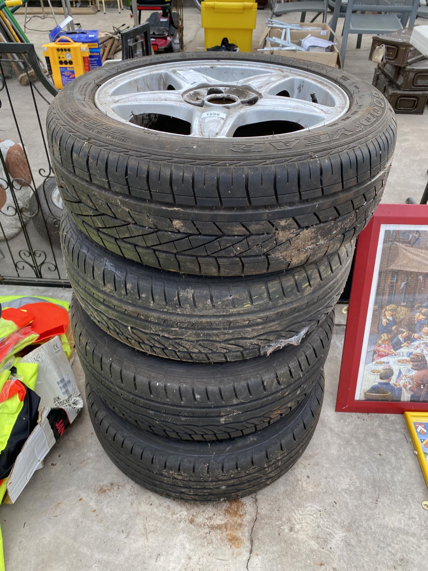 A SET OF FOUR CAR RIMS WITH 195/55R16 TYRES