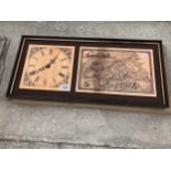 A FRAMED ETTCHED MAP OF CORNWALL AND A CLOCK