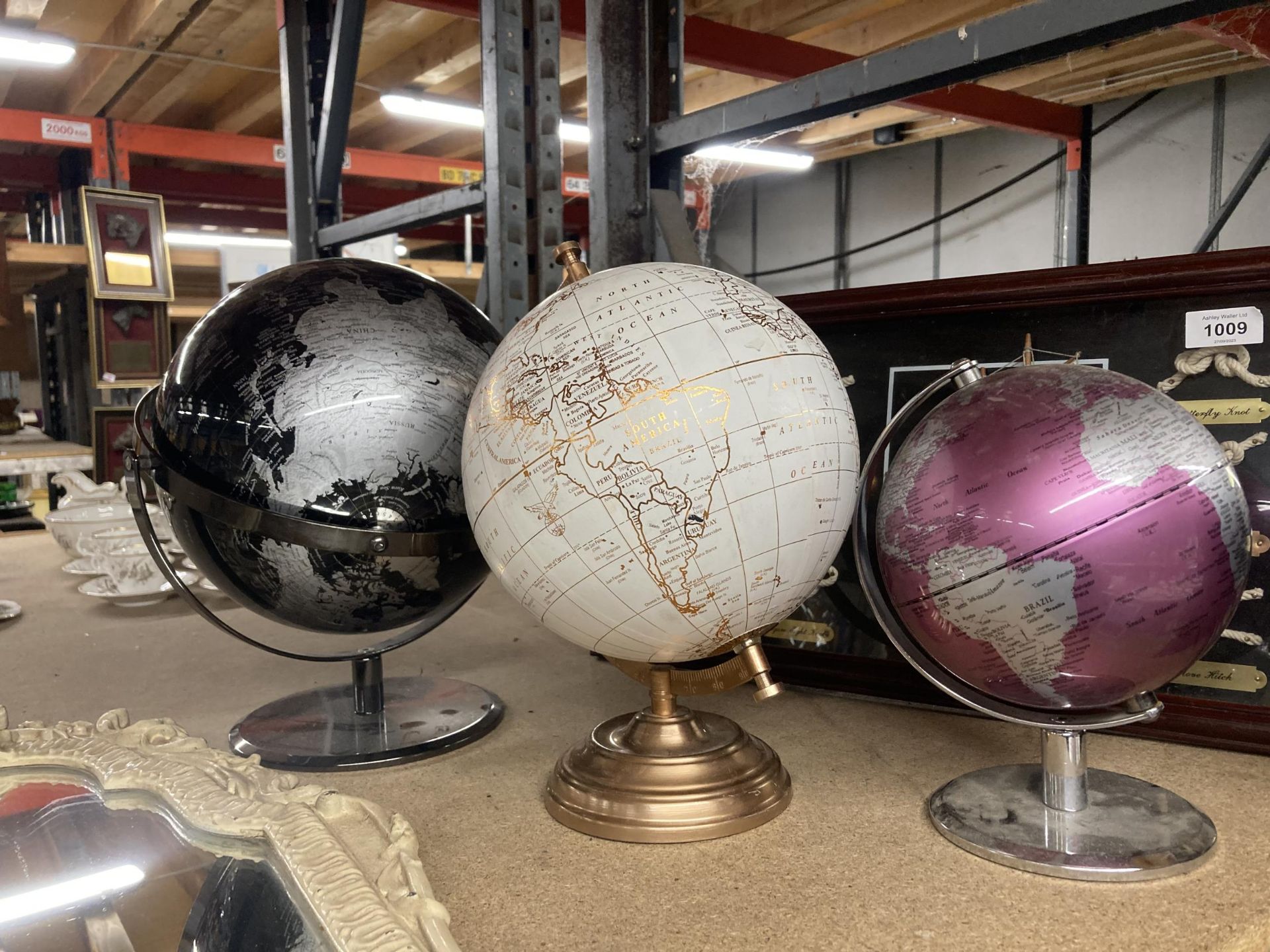 A GROUP OF THREE MODERN GLOBES