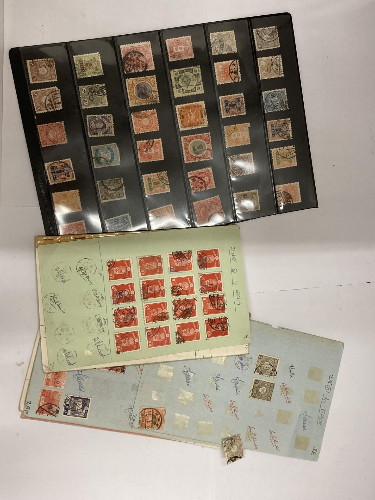 A QUANTITY OF EARLY JAPANESE STAMPS