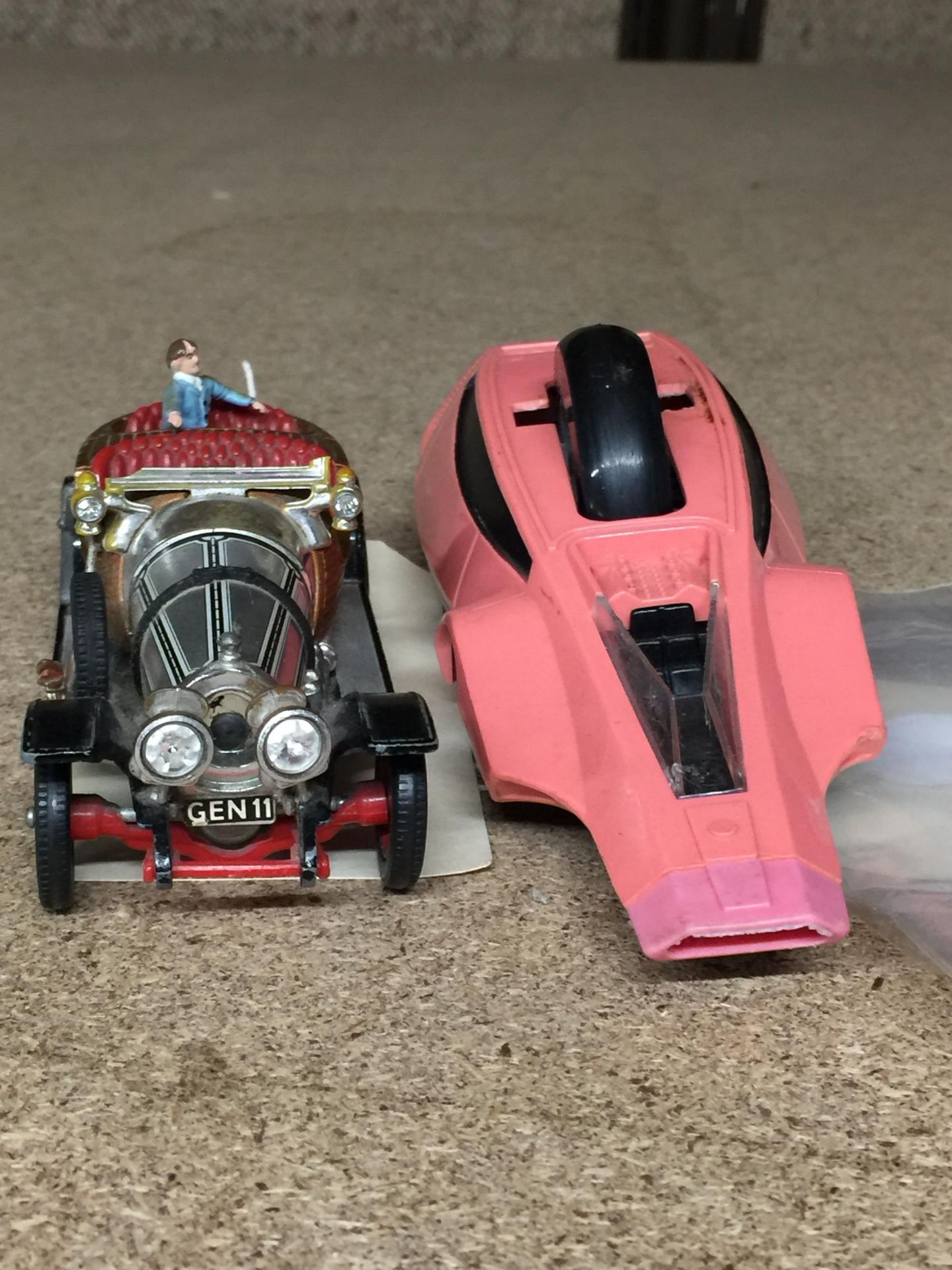 A CORGI CHITTY CHITTY BANG BANG CAR WITH A FIGURE PLUS A DINKY PINK PANTHER CAR WITH A PINK