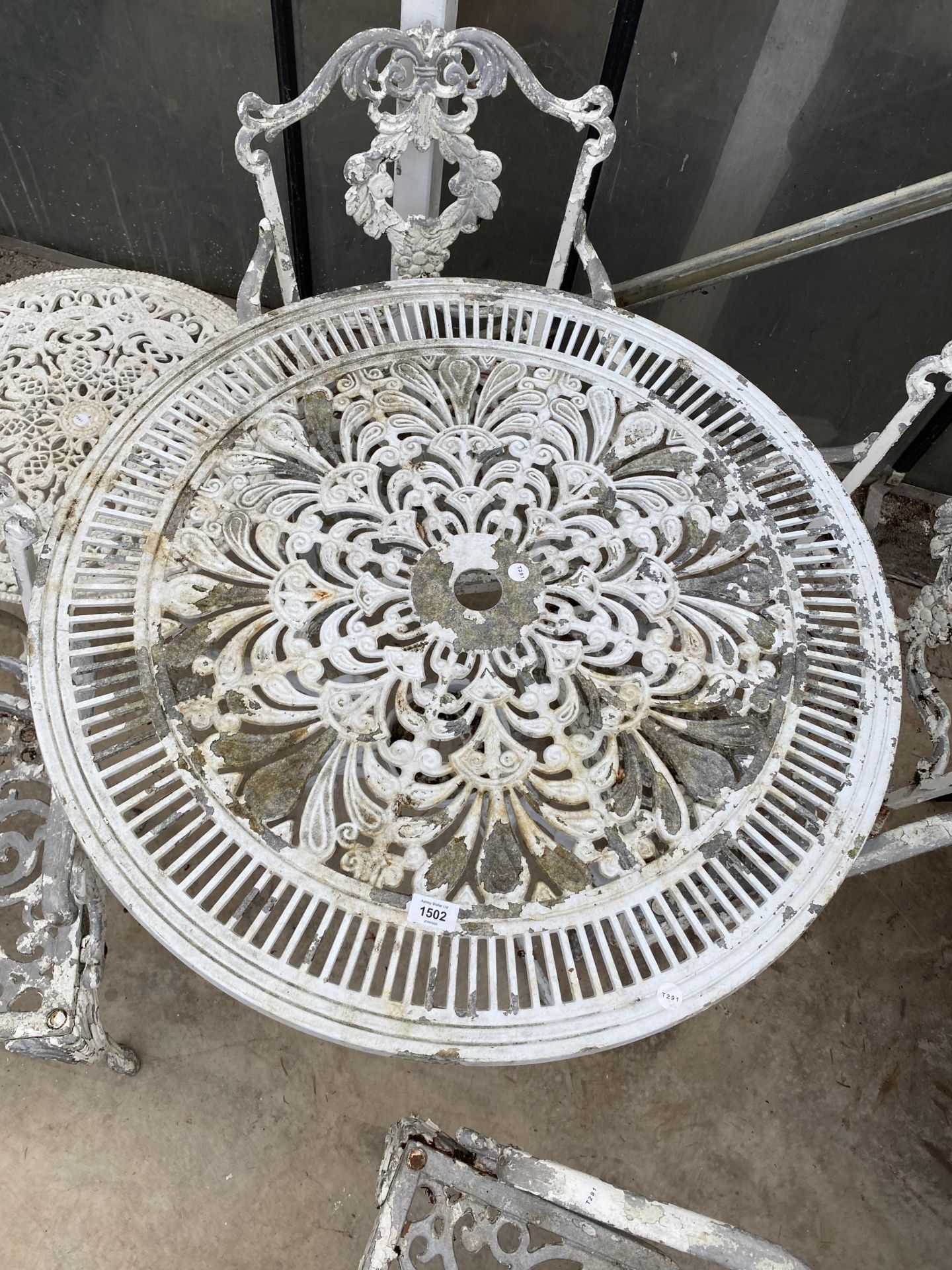A VINTAGE CAST ALLOY BISTRO SET COMPRISING OF A ROUND TABLE, FOUR CARVER CHAIRS AND A COFFEE TABLE - Image 5 of 5