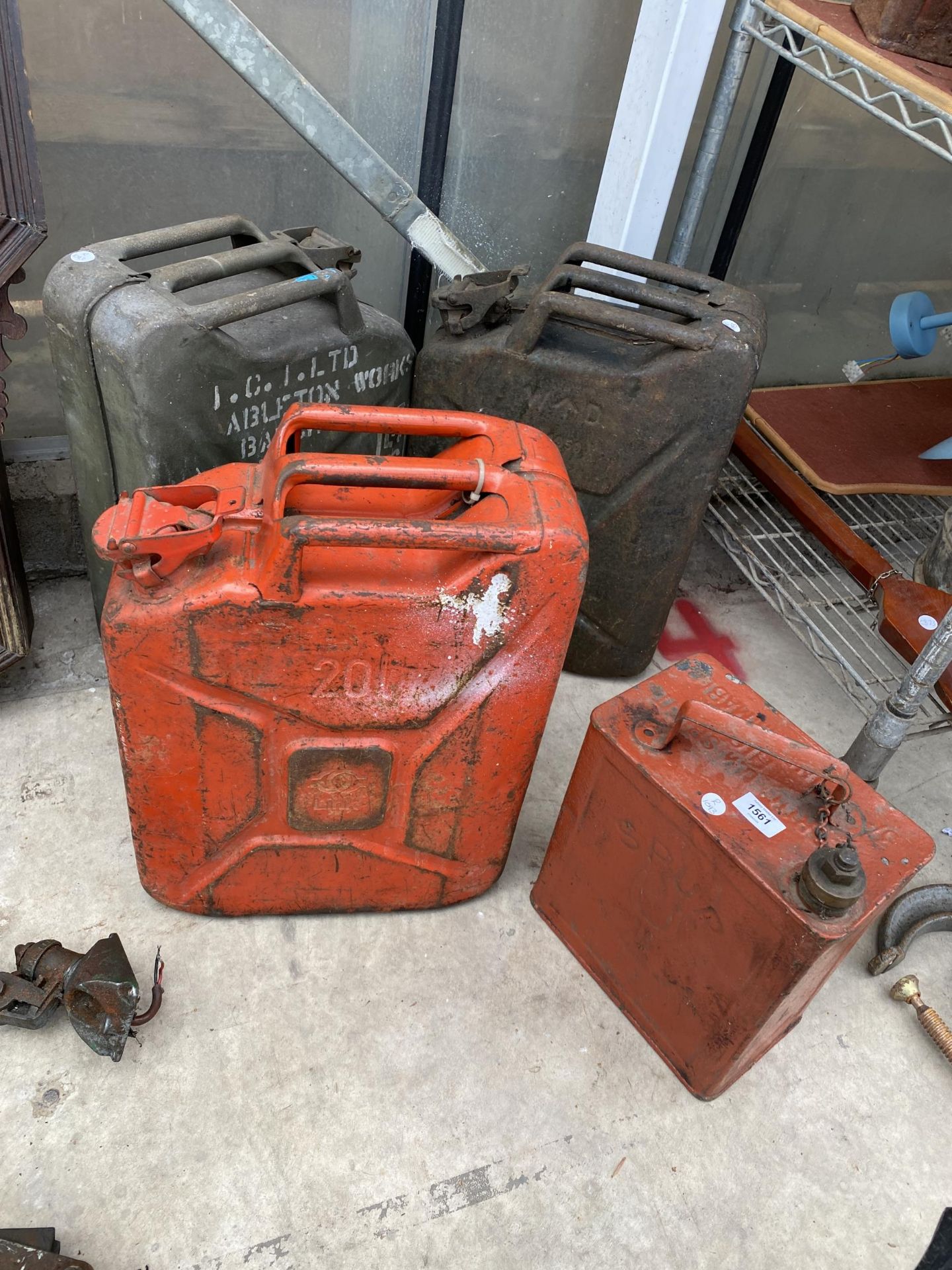 THREE METAL JERRY CANS AND A VINTAGE 'SPUR' FUEL CAN WITH BRASS CAP