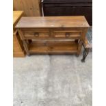 A PINE SIDE-TABLE WITH TWO DRAWERS AND POT BOARD, 47" WIDE