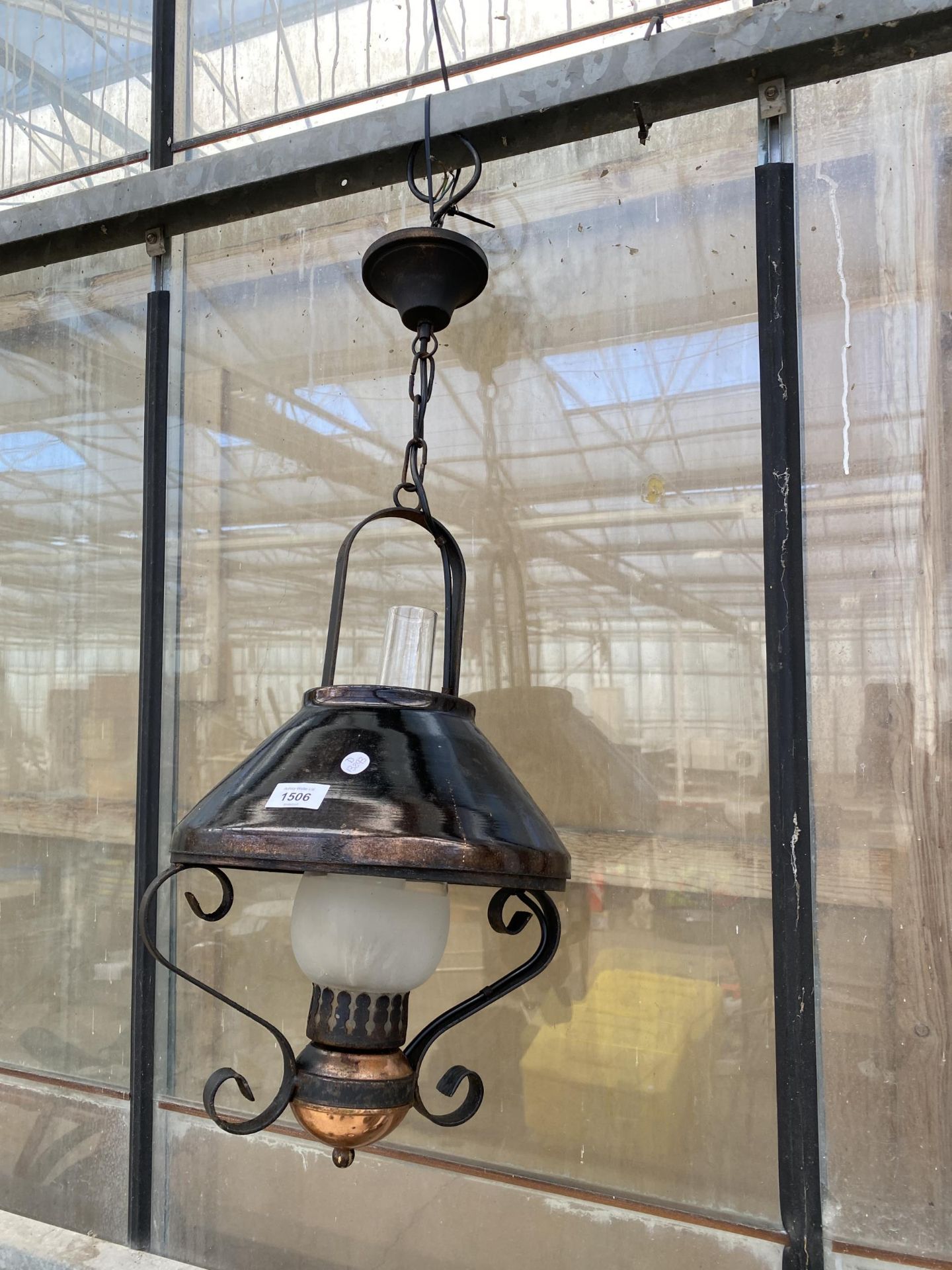 A DECORATIVE MID CENTURY COPPER AND STEEL LIGHT FITTING