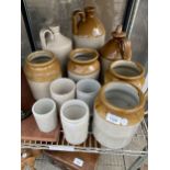 A LARGE QUANTITY OF STONEWARE POTS AND FLAGGONS