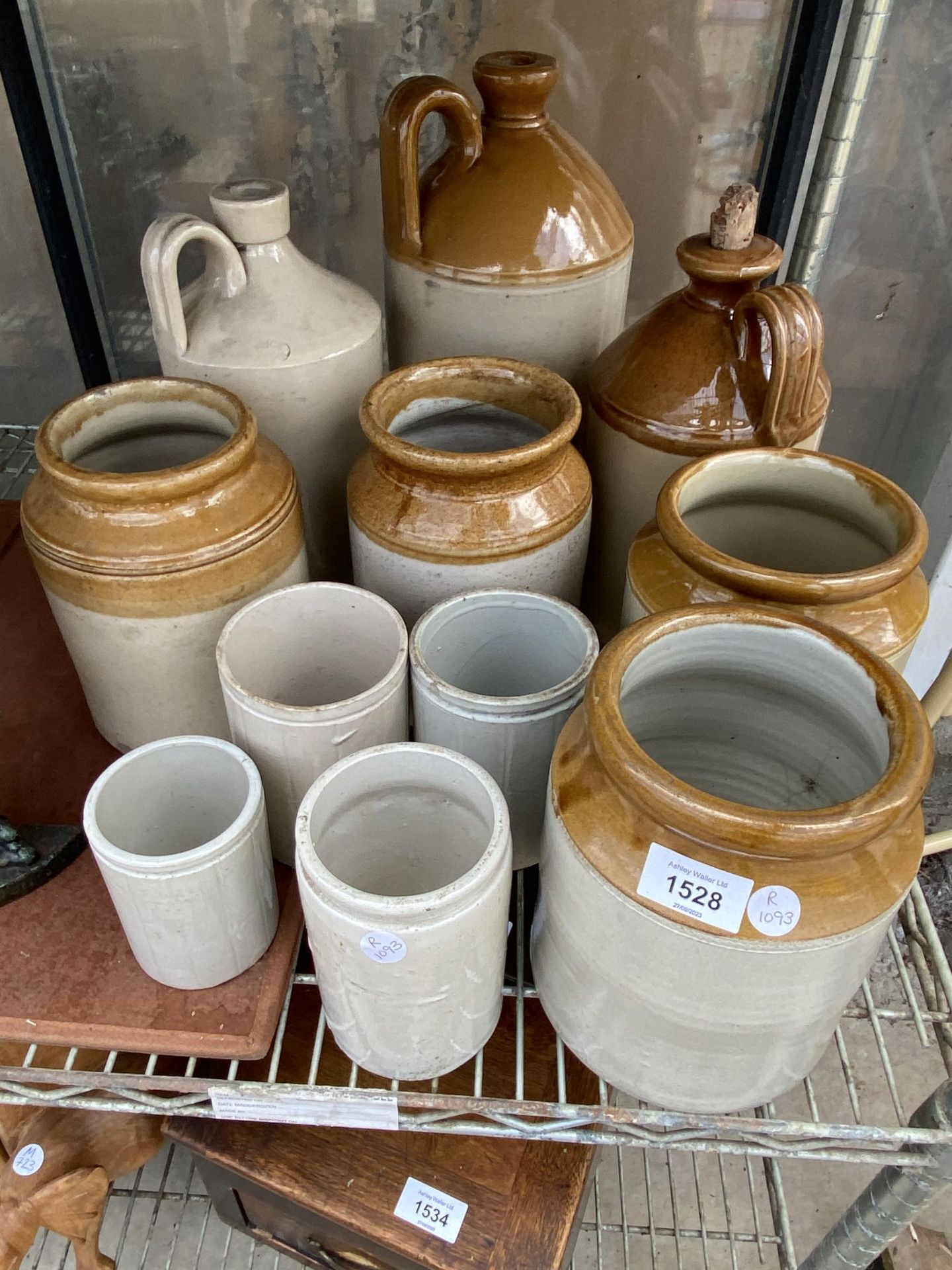 A LARGE QUANTITY OF STONEWARE POTS AND FLAGGONS