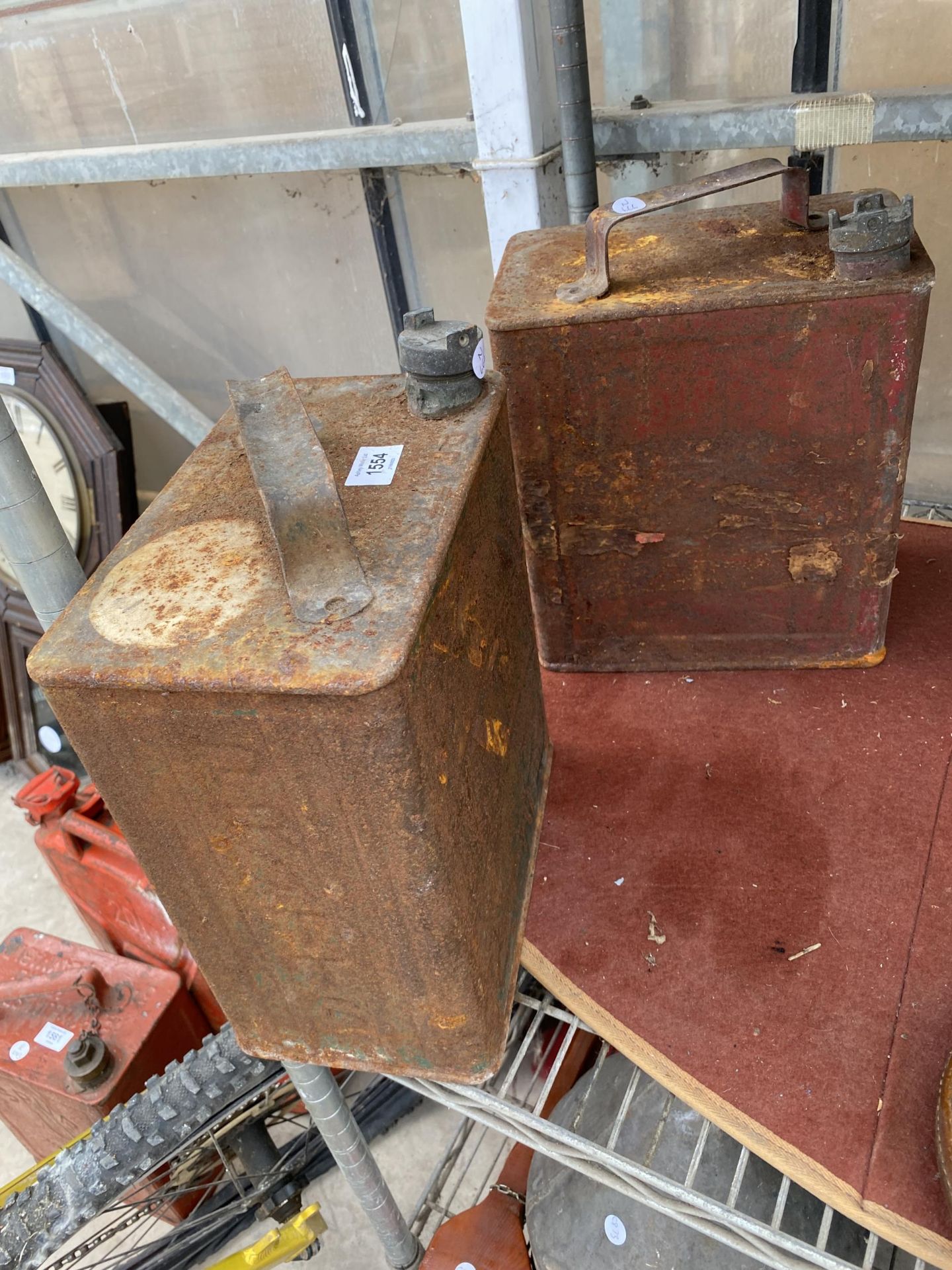 TWO VINTAGE FUEL CANS TO INCLUDE A PRATTS EXAMPLE, BOTH WITH BRASS CAP PRESENT